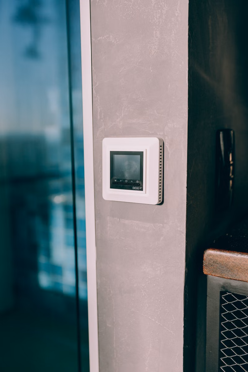 Modern thermostat installed in a Missouri home